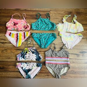 Set of 5 girls swimsuits girls size 10. Various surf brands